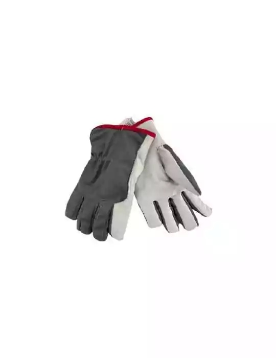 Asentaja sormikas pukinnahkaa vuorella